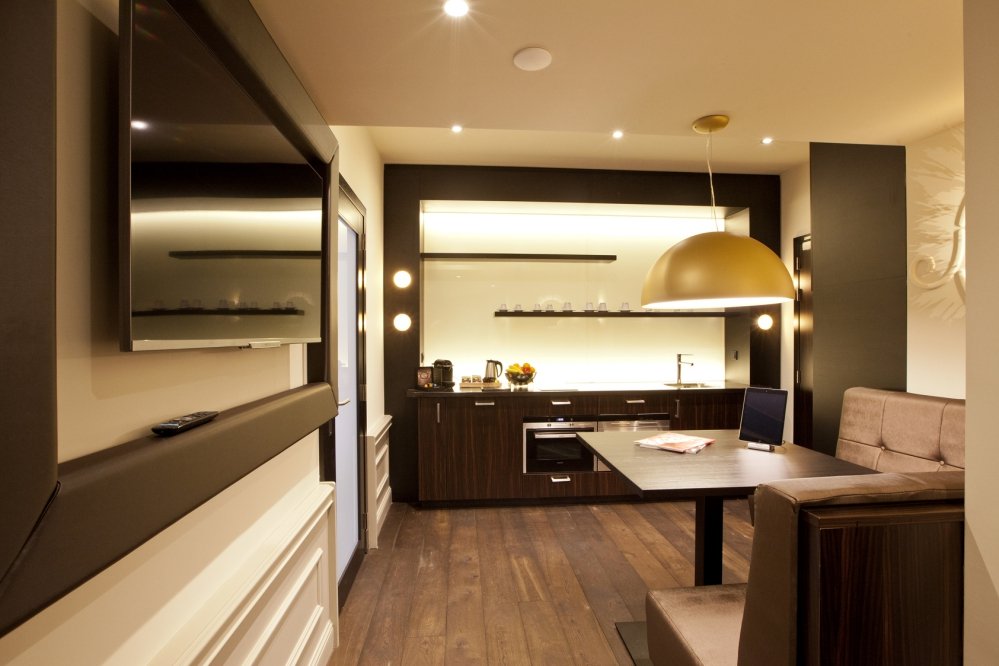 Cozy dining area with flatscreen TV