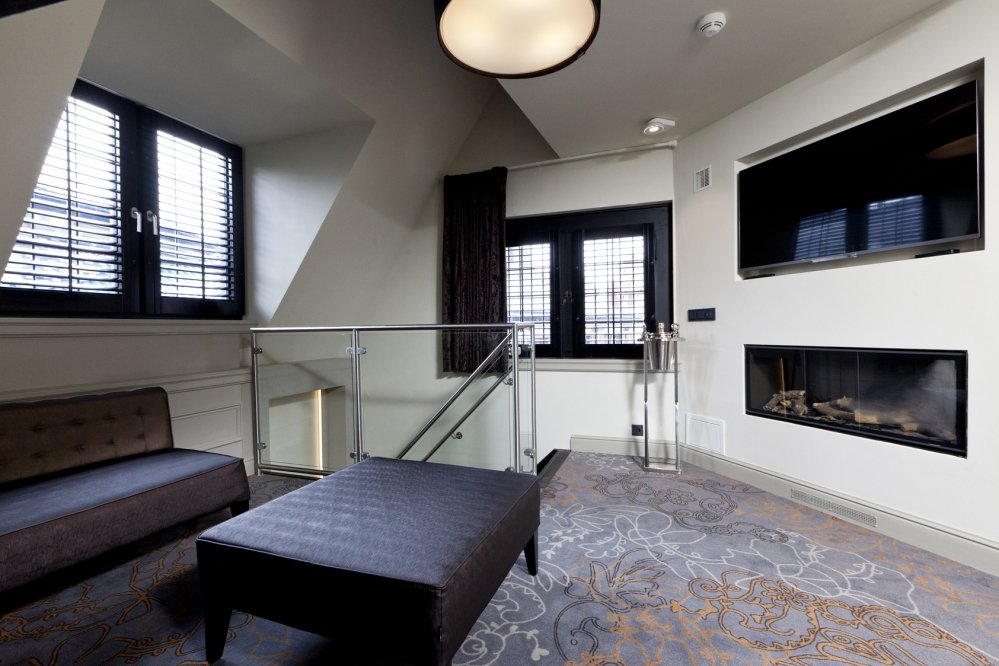 A seating area with a fireplace